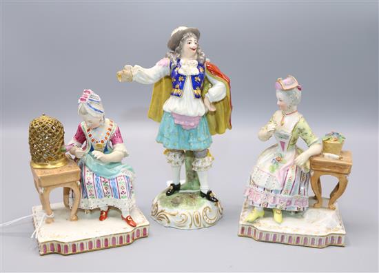 Pair of late Meissen seated figures of ladies and another figure